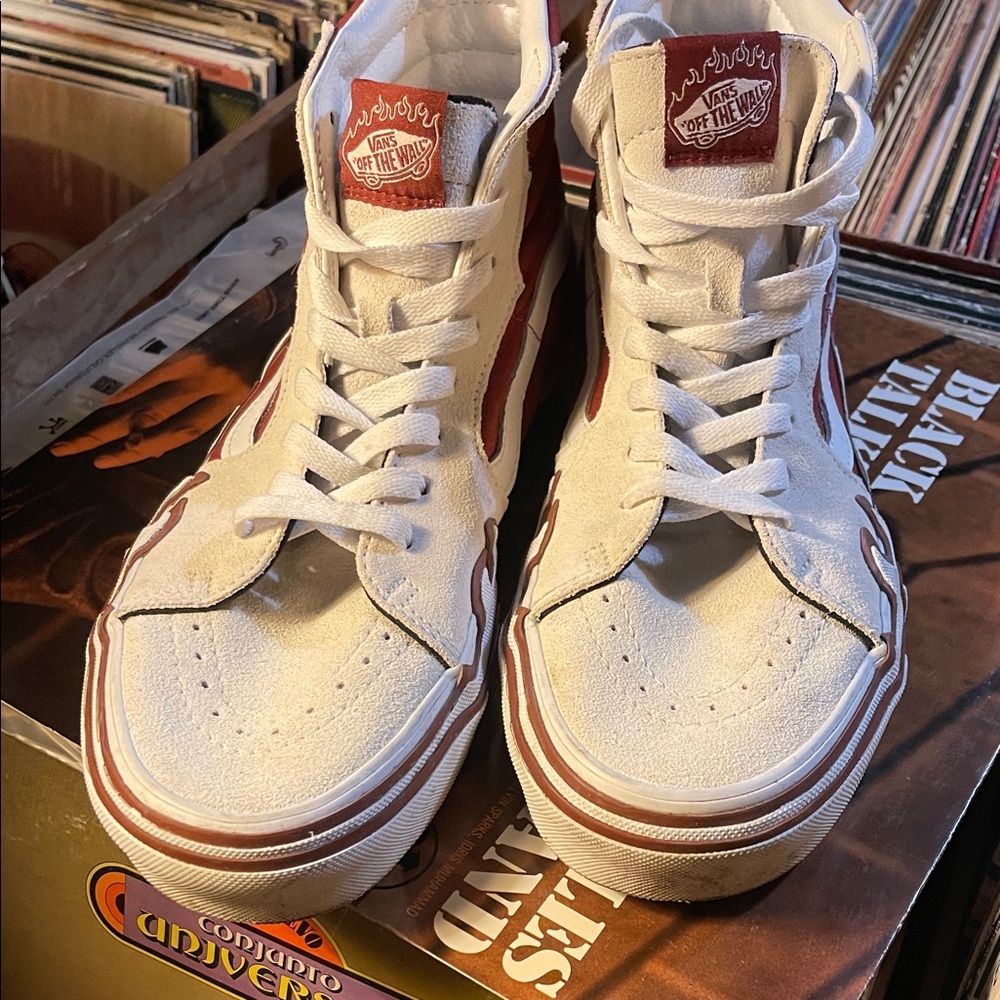 Vans Off the Wall White and Red High-Tops with flames.